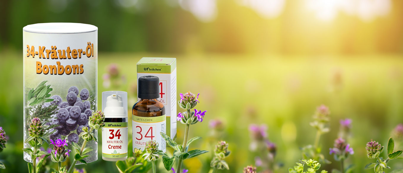 34 Kräuter-Öl, Creme und Bonbons stehen auf einer Kräuterwiese